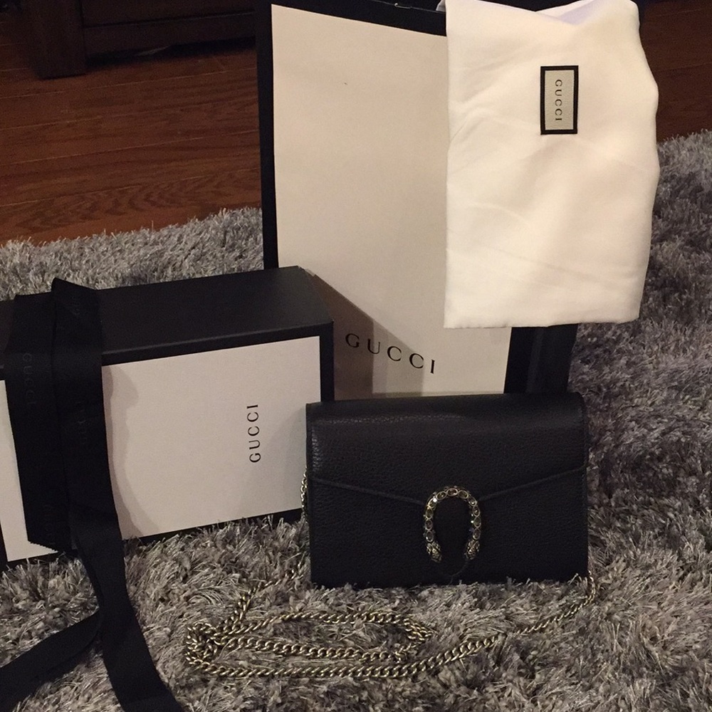 Brand new Gucci clutch with chain